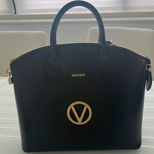 Valentino bag black leather from Italy. Authentic and new.